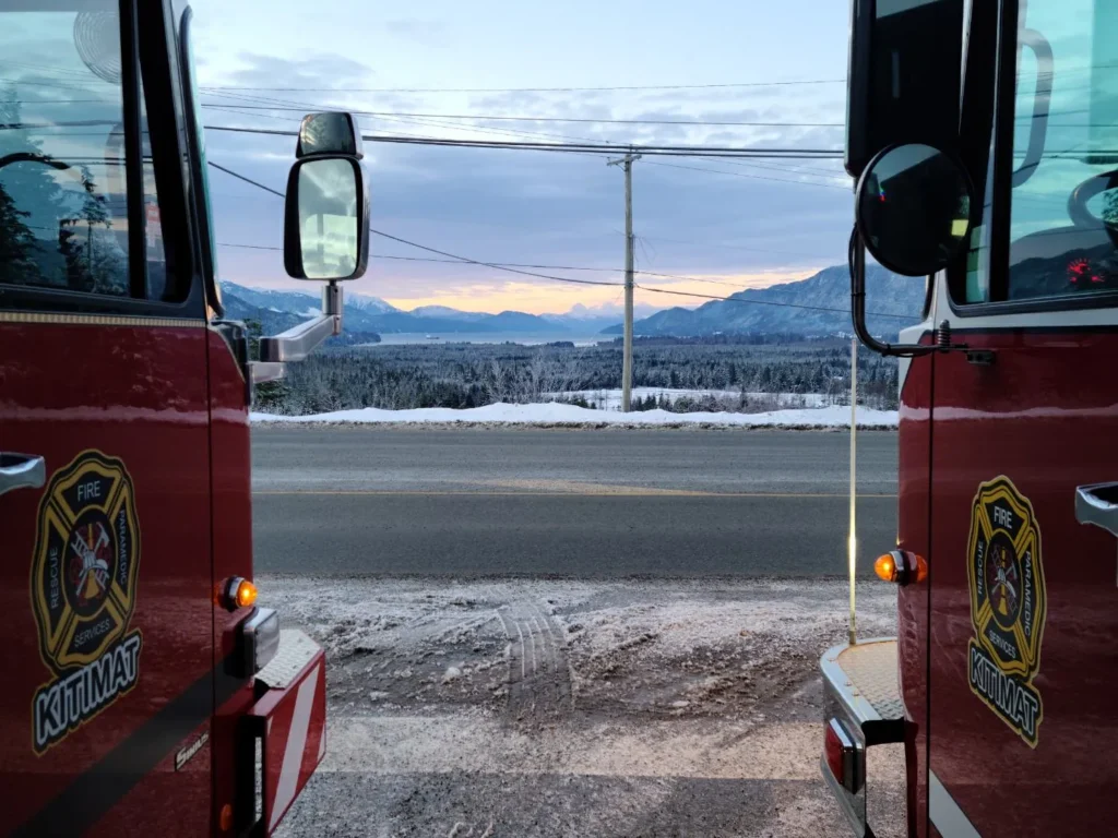 View between Kitimat fire apparatus toward the surrounding mountains